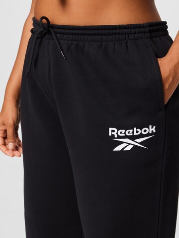 Loosefit Pantaloni di Reebok in nero