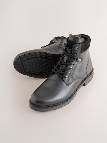 Next - Botas con cordones en negro