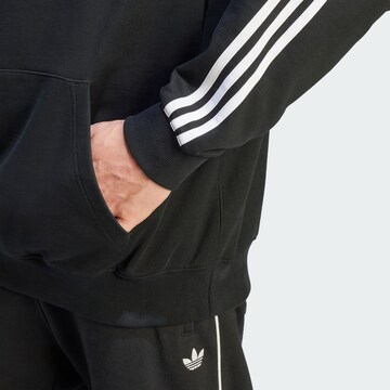 ADIDAS ORIGINALS Sweatshirt 'Adilenium' in Black