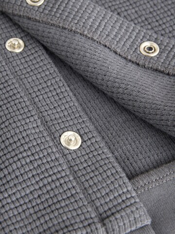 Next Jacke in Grau
