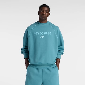 Sweat-shirt 'Trackside' new balance en bleu : devant