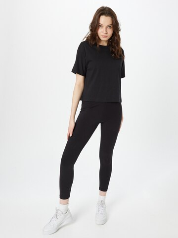 Champion - Camiseta en negro