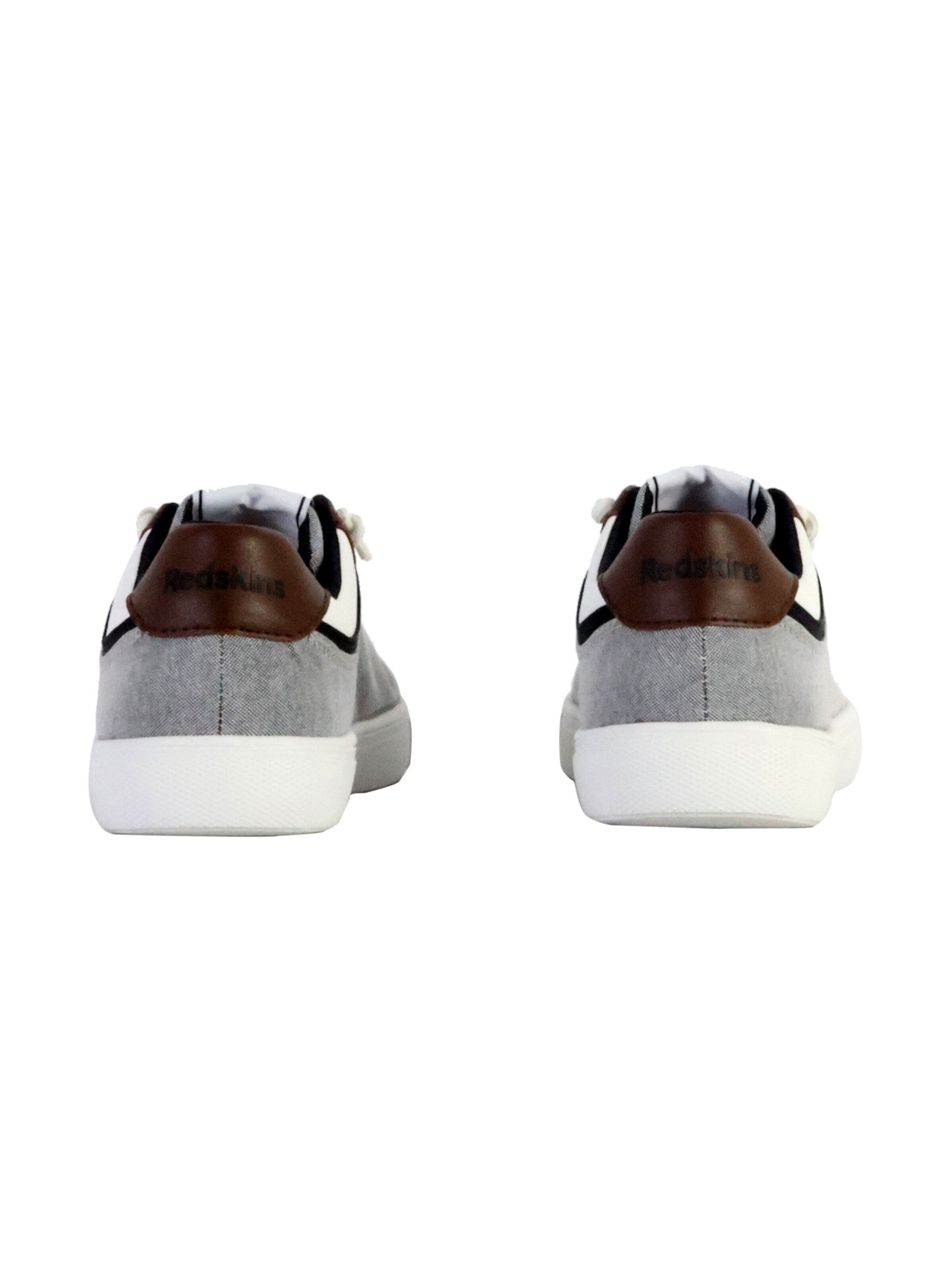 Chaussure de sport à lacets PUMA en gris
