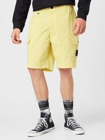 Calvin Klein Jeans Regular Cargo trousers in Yellow: front