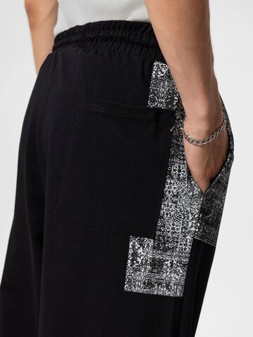 Loosefit Pantaloni 'Wax Plant' di VAMOS CLO in nero