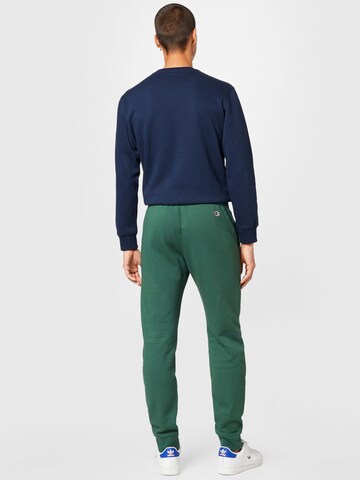 Champion Authentic Athletic Apparel Tapered Broek in Groen