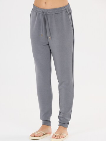 Athlecia - Tapered Pantalón deportivo 'Jacey' en gris: frente