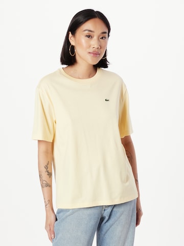 T-shirt LACOSTE en jaune : devant