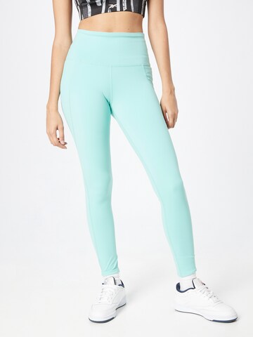 Reebok Skinny Workout Pants in Blue: front