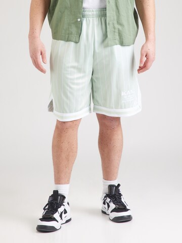 Loosefit Pantaloni di Karl Kani in verde: frontale