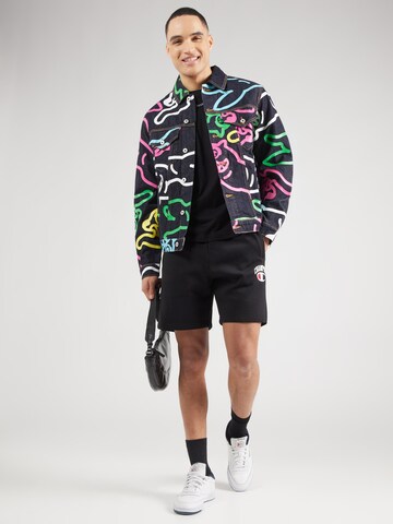 Maglietta di Champion Authentic Athletic Apparel in nero