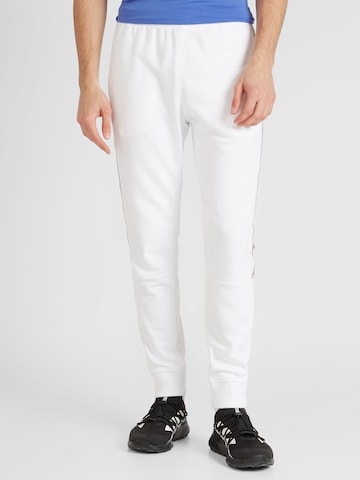 Effilé Pantalon Champion Authentic Athletic Apparel en blanc : devant