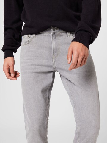 Slimfit Jeans 'Essentials Skim' di SCOTCH & SODA in grigio