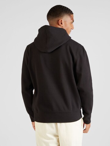 Calvin Klein JeansSweater majica 'Stencil' - crna boja