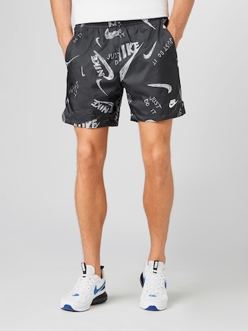 Regular Pantaloni de la Nike Sportswear pe negru: față