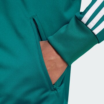 Veste de survêtement ADIDAS ORIGINALS en bleu