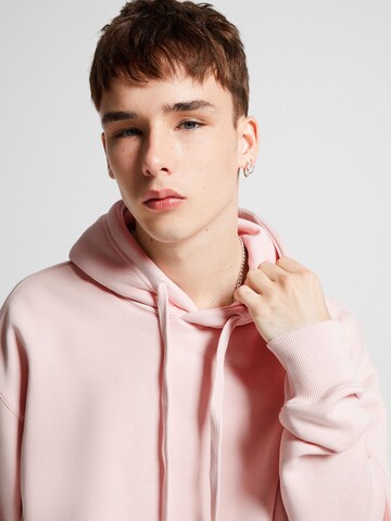 Sweat-shirt Bershka en rose