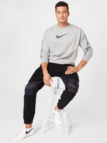 Nike SportswearSweater majica - siva boja