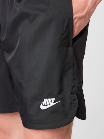 juoda Nike Sportswear Standartinis Kelnės 'Essentials'