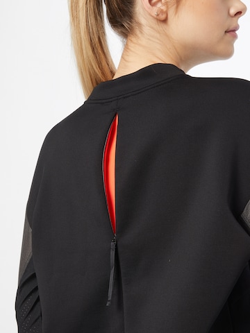 NIKE Sportsweatshirt 'Run Divsion' in Schwarz