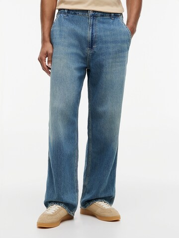 Tommy Jeans Loosefit Jeans 'Theo' in Blauw: voorkant