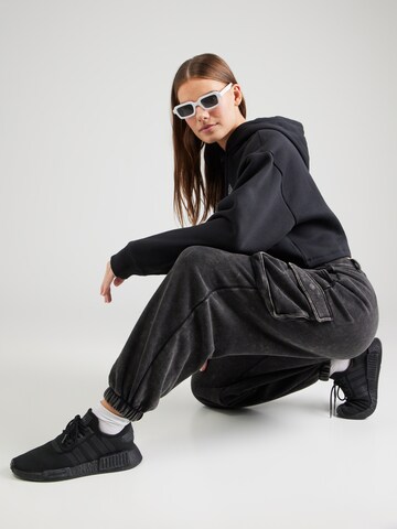 Tapered Pantaloni cu buzunare de la ADIDAS ORIGINALS pe negru