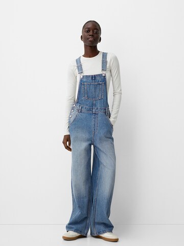 Loosefit Salopette en jean Bershka en bleu : devant