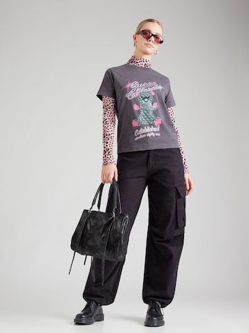 GUESS Póló 'BEAR' - fekete