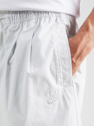 Nike Sportswear Loosefit Bandplooibroek 'CLUB SEOUL' in Grijs
