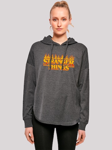 F4NT4STIC Sweatshirt 'Stranger Things Fire Logo Women Netflix TV Series' in Grey: front