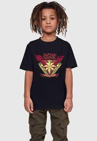 ABSOLUTE CULT T-Shirt 'Captain Marvel - Protector Of The Skies' in Schwarz: predná strana