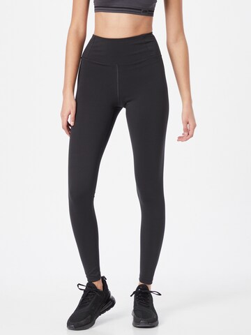 Girlfriend Collective Skinny Workout Pants in Black: front