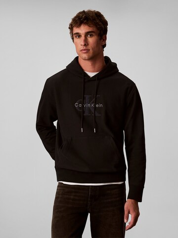 Calvin Klein Jeans Sweatshirt in Zwart: voorkant