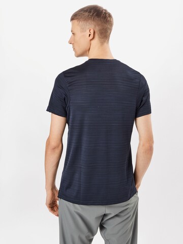 NIKE Functioneel shirt 'Superset' in Blauw