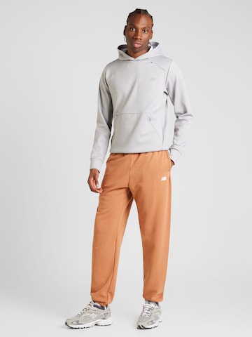 new balance Tapered Broek in Bruin