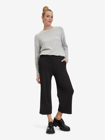 Wide leg Pantaloni di Cartoon in nero