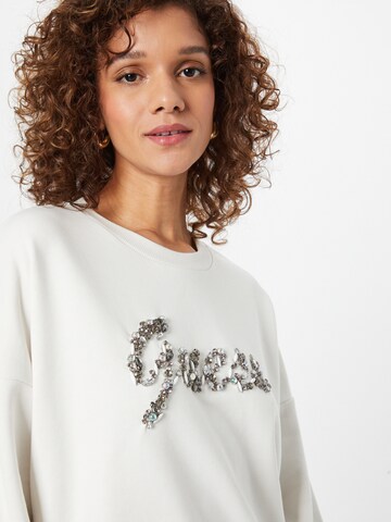 GUESSSweater majica 'MANILA' - bijela boja