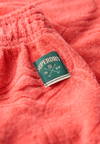 Superdry Regular Broek 'Country Club' in Oranje