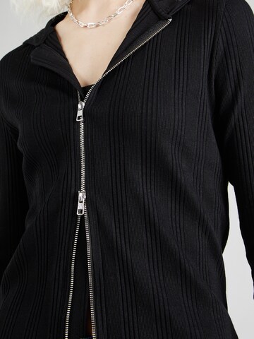 Calvin Klein Jeans Strickjacke in Schwarz
