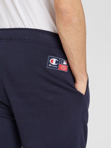 Champion Authentic Athletic Apparel Tapered Trousers 'Elastic' in Blue