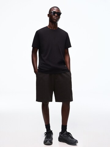 Bershka Trenirka za tek | črna barva