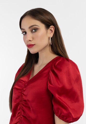 Camicia da donna di faina in rosso