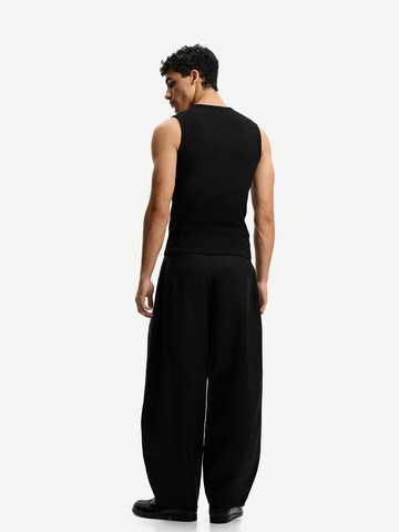 Loosefit Pantaloni con pieghe di Bershka in nero