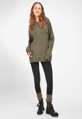 Pull-over include en vert