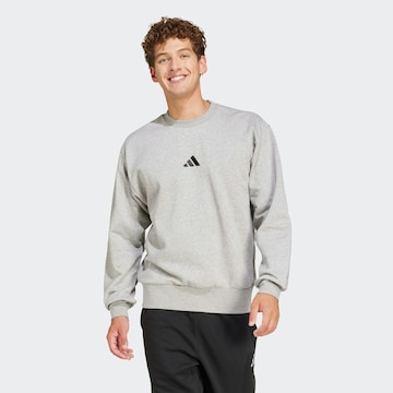 ADIDAS SPORTSWEAR Sports sweatshirt 'FEELCOZY' in Grey: front