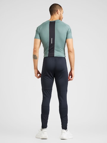 UNDER ARMOUR Slimfit Sporthose 'Challenger' in Schwarz