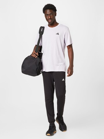 ADIDAS SPORTSWEAR Tapered Sports trousers 'Brandlove' in Black