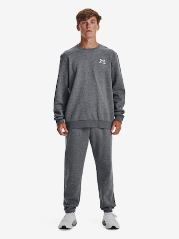 UNDER ARMOUR Sportsweatshirt 'Essential' in Grijs