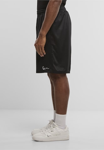 regular Pantaloni di Karl Kani in nero