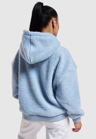 Sweat-shirt Karl Kani en bleu